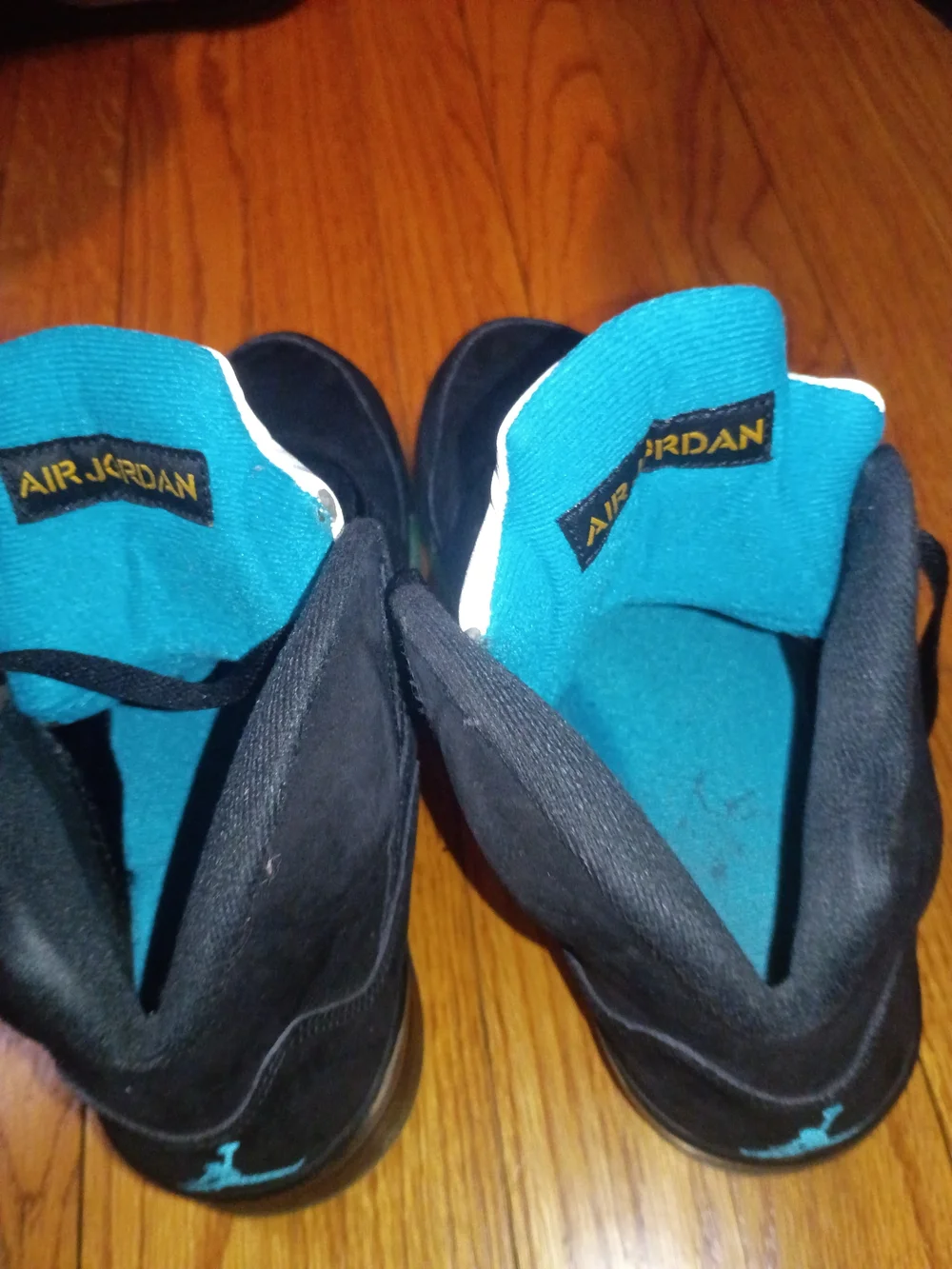 Jordan Men’s Black High-Top Sneakers with Yellow and Teal Accents
